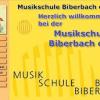 Die Startseite des Internet-Auftritts der Musikschule Biberbach. Die Farben Gelb und Orange dominieren. 