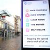 Ein Schild vor der Station Argyle Street im Stadtzentrum von Glasgow weist auf Abstands- und Hygieneregeln hin.