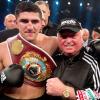 Marco Huck (l.) und sein Trainer Uli Wegener rechnen mit einer erfolgreichen Titelverteidigung.