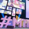Der Hashtag #MTM22 steht auf der Bühne während der 36. Medientage München.