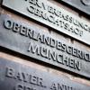 «Oberlandesgericht München» steht auf einem Schild.
