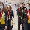 Denise Herrmann, Franziska Preuß, Roman Rees und Vanessa Hinz (l-r) kommen nach den Winterspielen am Frankfurter Flughafen an.