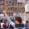 Ein Demonstrant protestiert in München gegen den Artikel 13 der geplanten europäischen Urheberrechtsreform. Allein in München spricht die Polizei von 40000 Teilnehmern. 