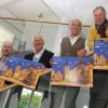 Sie präsentieren den neuen Adventskalender von Rotary und der MZ für den guten Zweck: (von links) Kurt-Jochen Walter, Präsident Karl-Heinz Holl, Rudolf Ruf und Karl Wohlfahrt. 	