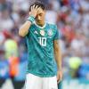 Mesut Özil soll sich nach Willen des DFB-Präsidenten Reinhard Grindel zur Erdogan-Affäre äußern.