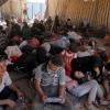 ARCHIV - Ein syrisches Flüchtlingslager wurde aus der Luft angegriffen - rund 30 Menschen starben. Symbolbild