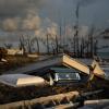Auf den Bahamas hat Hurrikan Dorian einen Friedhof verwüstet. Ein Sarg ragt aus einem Grab. Eine Woche nach dem Wirbelsturm werden noch immer tausende Menschen vermisst.