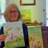 Maria Barnett mit ihrem ersten Kinderbilderbuch „Rubi, Karl und die Himbeeren“ und mit einer Zeichnung aus ihrem zweiten Buch, in dem die Geschichte fortgesetzt wird.