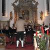 Einige Musikanten spielten in der St.-Jakobus-Kirche bei ihrem Jahreskonzert auf. Das Publikum genoss die weihnachtliche Stimmung in dem von Kerzen erhellten Gotteshaus.  	