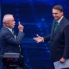 Brasiliens Präsidentschaftskandidaten Luiz Inacio Lula da Silva (l) und Jair Bolsonaro warben in einem TV-Duell um Stimmen.