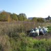 Plastiksäcke im Gras: Willkommen auf dem Gebiet des einstigen Todesstreifens.
