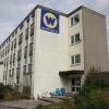 Im früheren Verwaltungsgebäude der Firma Walter Bau in Derching sollen Asylbewerber einziehen.