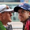 Deutsche Formel-1-Legenden: Sebastian Vettel (r) und Michael Schumacher.