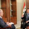 Der syrische Präsidenten Baschar al-Assad (r) im Gespräch mit Jürgen Todenhöfer. Bild: SWR dpa