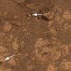 Nach wochenlangem Rätselraten haben Wissenschaftler die Herkunft eines plötzlich vor dem Marsrover «Opportunity» aufgetauchten Steins in Form eines Donuts (links unten) geklärt.