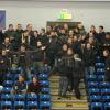 Fans des VfB Lübeck randalieren auf einer Tribüne der Sporthalle. Foto: Meincke/KBS dpa