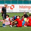 Freiburgs Coach Christian Streich und sein Team beim Trainingsauftakt.