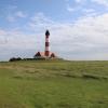 Der Leuchtturm Westerheversand misst 40 Meter und wurde 1906 errichtet. 