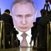 Journalisten verfolgen in einem Nebenraum live Putins Rede: „Das ist kein Bluff.“ 