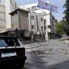 Ein zerstörtes Wohngebiet in Damaskus Foto: SANA dpa