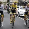 Christopher Froome (M) hat zum vierten Mal die Tour de France gewonnen. Foto: Benoit Tessier
