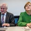 Bundeskanzlerin Angela Merkel CDU wartet neben Horst Seehofer CSU, Bundesminister für Inneres, Heimat und Bau, auf den Beginn der Sitzung der Unionsfraktion im Bundestag.