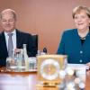 Betont optimistisch für die weitere Regierungsarbeit: Bundeskanzlerin Angela Merkel (CDU) und Finanzminister Olaf Scholz (SPD).