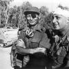 Der damalige israelische Verteidigungsminister und General Mosche Dajan (l.) mit dem damaligen Generalmajor Ariel Scharon, der einen Kopfverband trägt, aufgenommen im Oktober 1973 auf der ägyptischen Seite des Suezkanals während des 4. israelisch-arabischen Krieges.