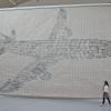 Ein Kunstwerk von Thomas Bayrle: Ein acht Meter hohes und 13 Meter breites Flugzeug, das aus vielen kleinen Bildern zusammengesetzt ist. 