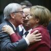 EU-Kommissionspräsident Jean-Claude Juncker unterstützt Bundeskanzlerin Angela Merkel.