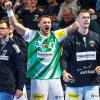 Berlins Trainer Jaron Siewert (l-r), Soeren Fuhrmann und Max Beneke jubeln.