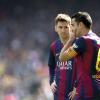 Standen viele Jahre zusammen im Barça-Trikjot auf dem Platz: Lionel Messi (l) und Xavi.