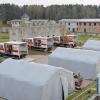 Probe für den Ernstfall: Bei einer länderübergreifenden Katastrophenschutz-Übung auf einem Truppenübungsplatz hat das Rote Kreuz ein mobiles Notfall-Krankenhaus aufgebaut.