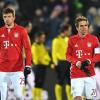 Nach der Niederlage gegen Rostow gehen Thomas Müller (l) und Philipp Lahm vom Platz.