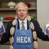 Großbritanniens Premier Boris Johnson hat sich schon im Wahlkampf für Würstchen-Produzenten eingesetzt. Doch die Aufgabe nun ist größer. 	