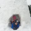 Der zehnjährige Maximilian Wohlhüter aus Gundelfingen und seine fünf Jahre alte Schwester Madlen genießen ihr gewaltiges Schneeiglu.	

