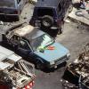 Blumen der Trauer liegen am 19. Juli 1992 in Palermo auf der Motorhaube des Wagens, in dem der Richter Paolo Borsellino starb. Der berühmte Mafiajäger sowie fünf seiner Leibwächter wurden bei dem Anschlag durch die Mafia getötet, rund 17 Menschen verletzt.