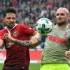 Der 1. FC Köln (rechts Konstantin Rausch) erkämpfte sich in Hannover den ersten Punkt der Saison.