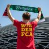 Ein Fanschal nur für Mitglieder: Der Fußball-Bundesligist FC Augsburg wirbt mit einem neuen Konzept und der Kampagne "Wir der FCA" für mehr Mitglieder.