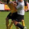 Beim letzten Duell in Pullach musste sich der TSV Rain knapp mit 0:1 geschlagen geben. Das Bild zeigt Johannes Müller (weißes Trikot) im Zweikampf.  	