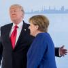 Fast so etwas wie eine angedeutete Umarmung: Die Stimmung zwischen Bundeskanzlerin Angela Merkel und US-Präsident Donald Trump war nicht so frostig wie beim letzten Treffen der beiden. 	