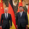 Chinas Präsident Xi Jinping (r) empfing Bundeskanzler Olaf Scholz in Peking.
