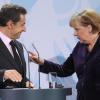 Nicolas Sarkozy und Angela Merkel planen ein sogenanntes «Grünbuch» mit konkreten Vorschlägen für eine Angleichung der Firmenbesteuerung. Foto: Wolfgang Kumm / Archiv dpa