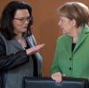 Kanzlerin Angela Merkel mit Andrea Nahles: Vor allem der Wirtschaftsflügel der CDU/CSU-Fraktion feuert gegen „Irrsinn“ und „Regulierungswahn“ aus dem Haus der Sozialdemokratin.  