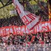 Fans vom 1. FC Union Berlin halten ein Banner mit dem Schriftzug: «Schluss mit dem Vermarktungswahn!».