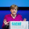 Wie soll Deutschland umgehen mit Konfliktherden und aggressiven Regimes? Auf dem Katholikentag gab sich Angela Merkel als pragmatische Realpolitikerin.