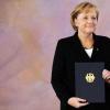 Merkel mit Denkzettel als Kanzlerin wiedergewählt