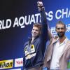 Michael Phelps (rechts) musste im vergangenen Jahr seinen letzten Weltrekord an den jungen Franzosen Leon Marchand abtreten. Der trägt nun die Gold-Hoffnungen der Gastgeber auf seinen Schultern. 