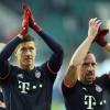 Schlussjubel: Robert Lewandowski und Franck Ribery freuen sich über das 2:0 gegen Wolfsburg.