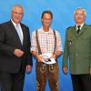 Auch Rainer Martin (Mitte) aus Neuburg erhielt die Medaille für seinen Beitrag zur Inneren Sicherheit.